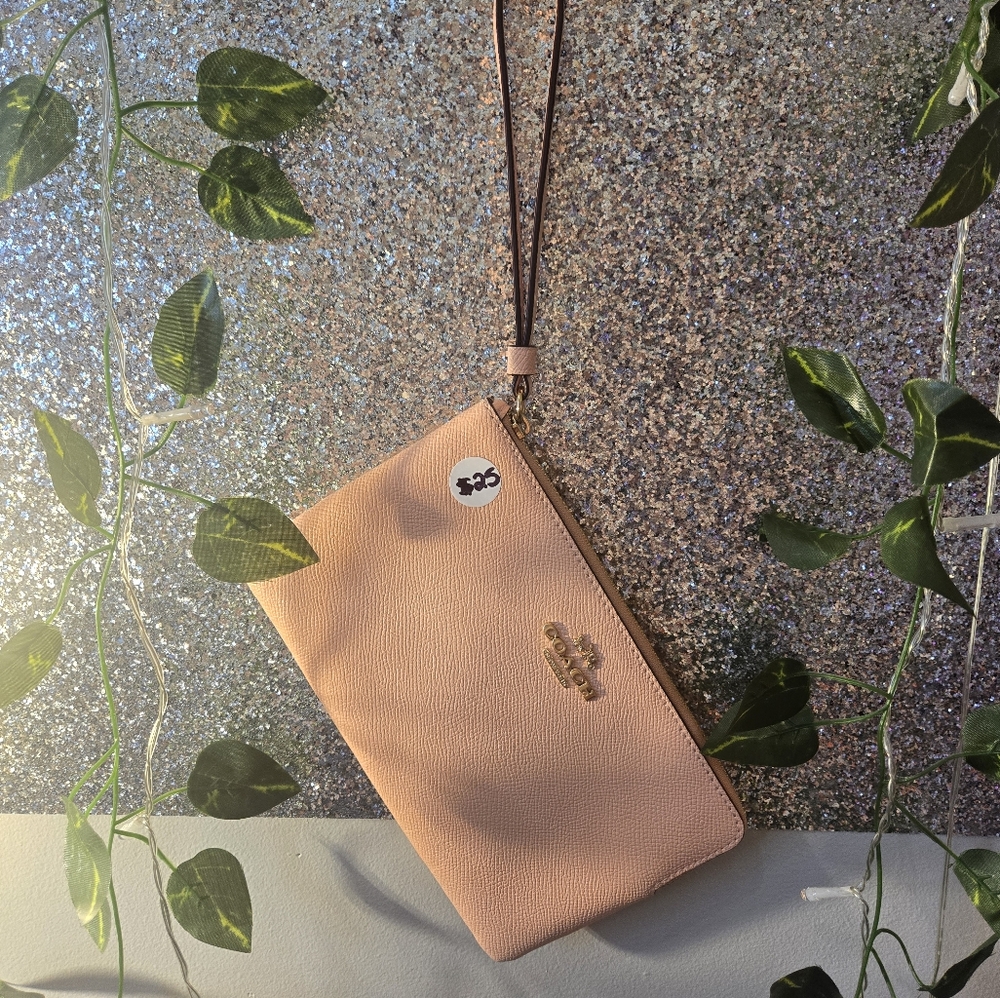 Coach Tan Leather Clutch with Minimalist Design